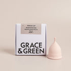 A box containing a reusable menstrual cup for eco-friendly and sustainable period care